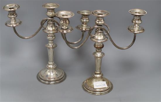 A pair of three branch plated candelabra height 28.5cm